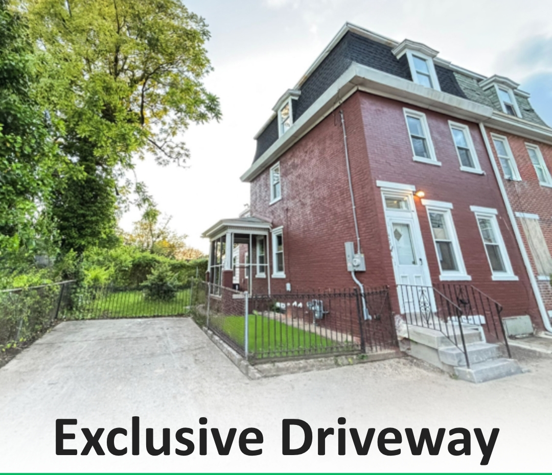 Exclusive driveway beside the red-brick home at 438 Lawrence St in Burlington, NJ.